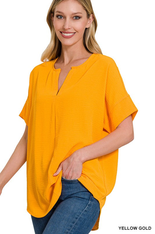 WOVEN AIRFLOW SPLIT NECK SHORT SLEEVE TOP